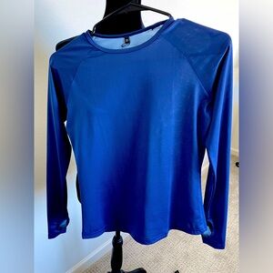 Tri Sirena long sleeved light weight running top. Size XS. Never worn. No tags.